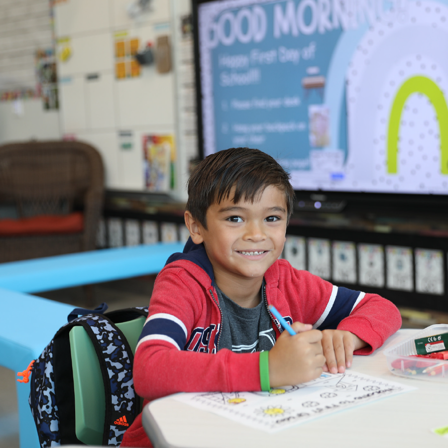 Kid Smiling while working